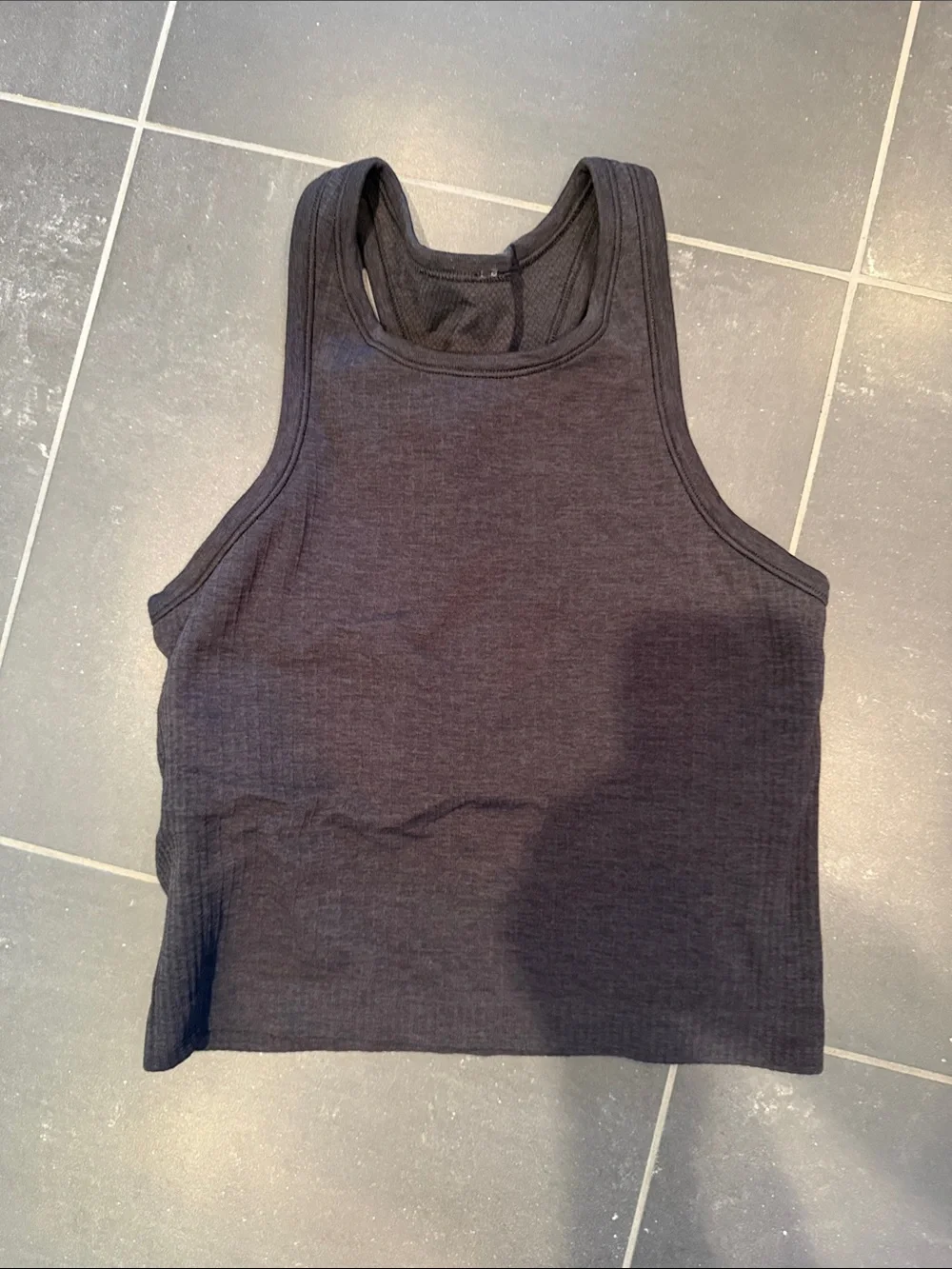 Lululemon black Ebb to Street Cropped Racerback Tank Top Light Support size 4